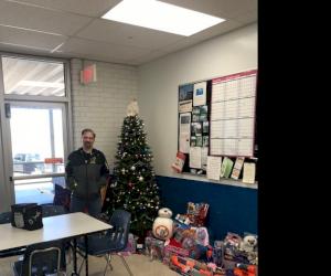 Tyler Coupling donates toys for the holidays